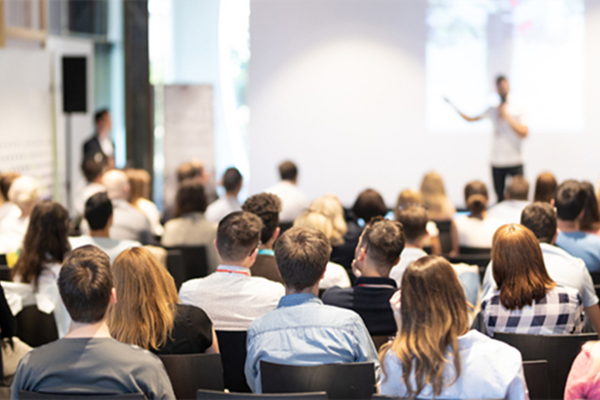 Crowd watching a seminar